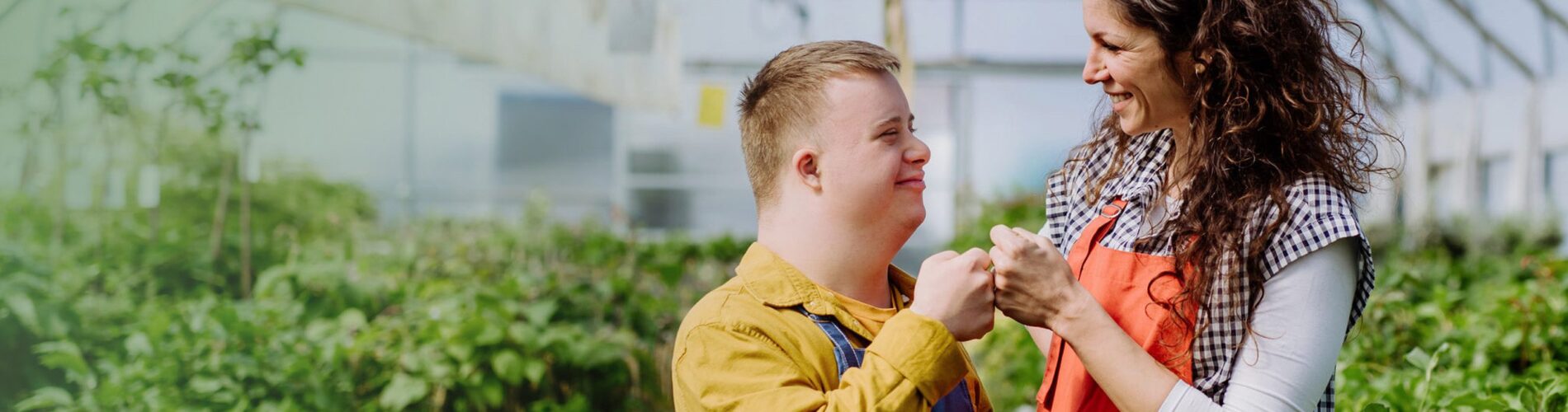 slider-fill Smiling boy and adult fist pumping!